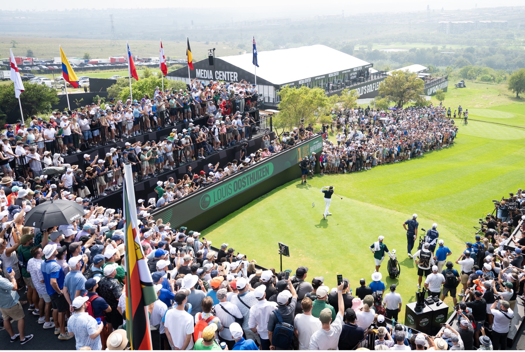 LIV Golf South Africa Steyn City, Southern Guards team South Africa golf, Bryson DeChambeau Steyn City round 1, Charles Howell III LIV Golf leader, Louis Oosthuizen Steyn City crowd, Branden Grace 7 under round, Charl Schwartzel golf South Africa, Midrand golf tournament crowd, LIV Golf Johannesburg event, Kikuyu rough Steyn City course, Joburg ETC