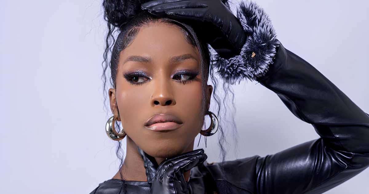 Ilano Big Brother Mzansi housemate, Ilano transgender contestant South Africa, Big Brother Mzansi season 2026 house interior, Ilano glam makeup Big Brother house, Ilano cooking in Big Brother Mzansi kitchen, South African reality TV representation LGBTQ, Big Brother Mzansi week seven eviction, Ilano portrait reality TV contestant, Mzansi Magic Big Brother housemates 2026, Joburg ETC