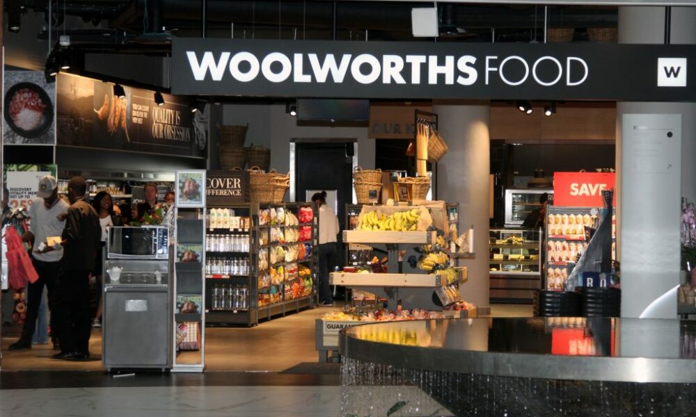 Woolworths South Africa store shelves, Woolworths ready meals display, In2food factory South Africa, packaged convenience food SA, Woolworths bakery section, premium groceries Johannesburg, food manufacturing South Africa, Woolworths fresh produce aisle, South African retail food industry, Joburg ETC