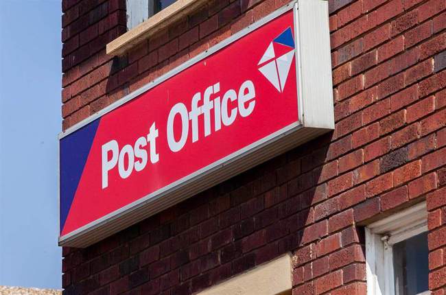 South African Post Office building, Sapo branch South Africa, Post Office queue South Africa, rural South African post office, Sapo workers South Africa, South African postal services counter, Communication Workers Union protest South Africa, Sapo community services South Africa, South African mail service building, public post office South Africa, Joburg ETC