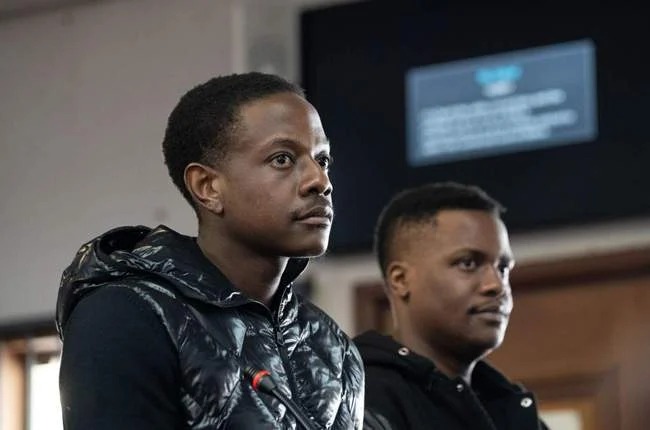 Bellarmine Chatunga Mugabe court appearance Johannesburg, Alexandra Magistrates Court Johannesburg exterior, Mugabe family son Bellarmine Chatunga Mugabe, Hyde Park Johannesburg crime scene investigation, Johannesburg magistrates court proceedings South Africa, Robert Mugabe son legal case South Africa, Johannesburg court security outside Alexandra Magistrates Court, Bellarmine Chatunga Mugabe legal team court arrival, Alexandra Magistrates Court Johannesburg courtroom scene, Joburg ETC