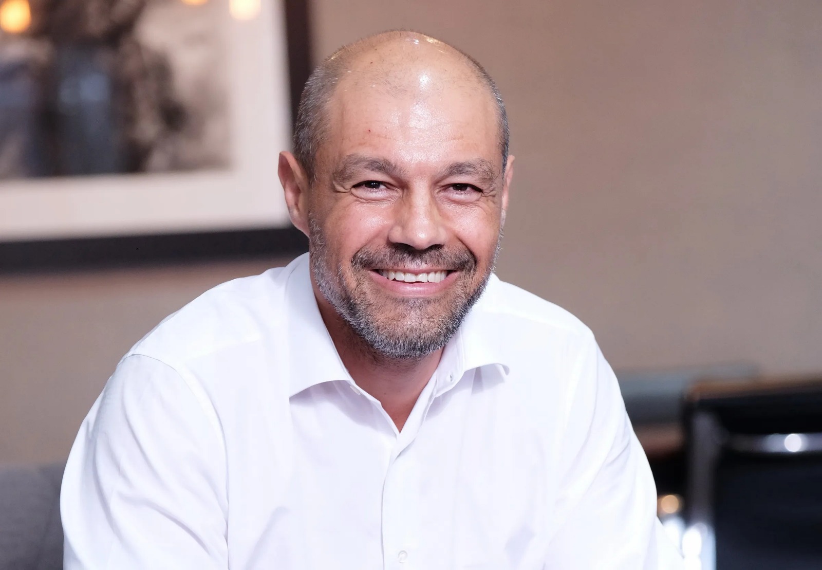 Zak Calisto portrait South Africa, King Price insurance office South Africa, Cartrack vehicle tracking device, Karooooo headquarters, South African insurance industry 2025, Porcupine Union data analytics, Competition Commission South Africa building, Joburg ETC