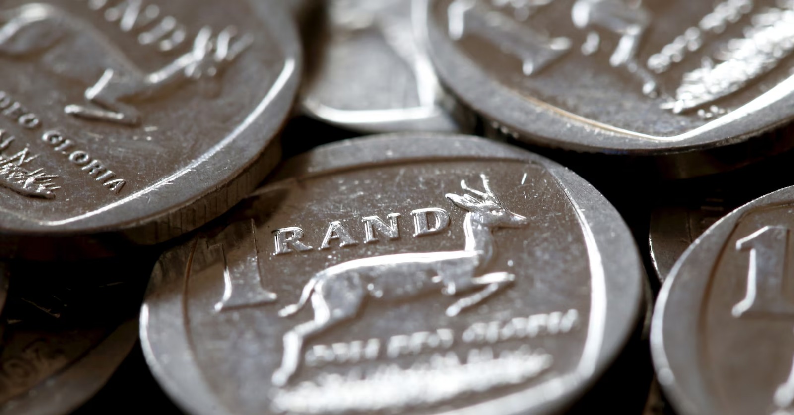 South African rand 2026, rand vs dollar March 2026, petrol price increase South Africa, oil price impact SA economy, inflation South Africa fuel costs, emerging market currencies rand performance, South Africa Reserve Bank rates 2026, Nigeria Angola oil benefit currencies, global oil shock South Africa, Joburg ETC