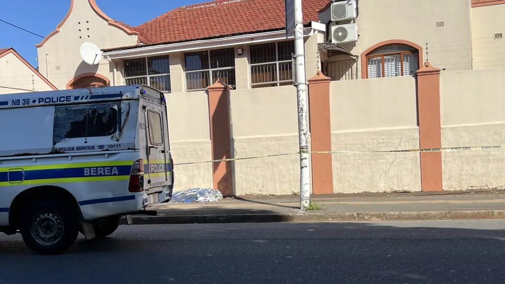 KZN police shooting scene, Berea Botanic Gardens Road incident, SAPS officer robbery attempt South Africa, ALS paramedics response KZN, Eldorado Park mass shooting investigation, Johannesburg crime scene police, South Africa anti gang unit arrest, Lenasia Magistrates Court suspects, Joburg ETC