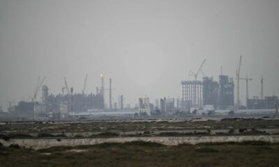 Gulf oil infrastructure damage, QatarEnergy gas processing plant strike, Duqm port drone attack Oman, Fujairah oil storage fire UAE, Strait of Hormuz shipping route, aluminium price spike London Metal Exchange, LNG production halt Qatar, Gulf drone strikes 2026, Joburg ETC