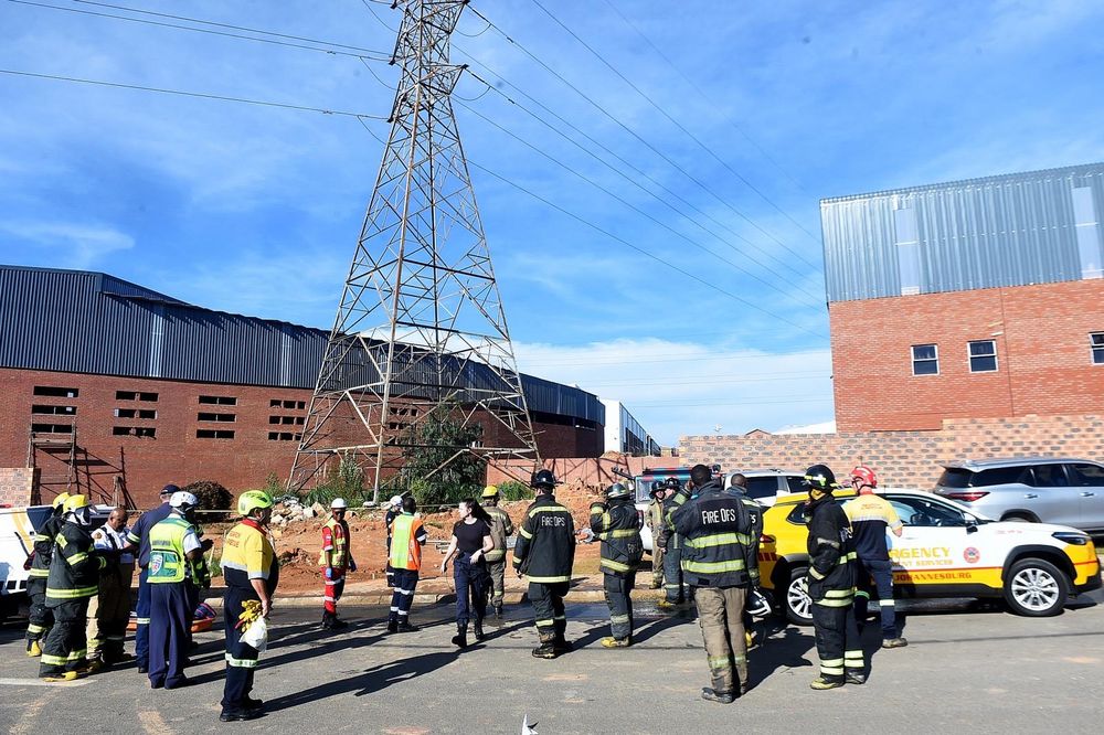 Ormonde building collapse Johannesburg, Amethyst Business Park collapse site, Johannesburg rescue workers rubble, emergency response Ormonde collapse, building collapse investigation Johannesburg, construction safety South Africa, Dean McPherson site visit Ormonde, Dada Morero inspection collapse site, Gauteng officials building collapse scene, Johannesburg urban safety concerns, Joburg ETC