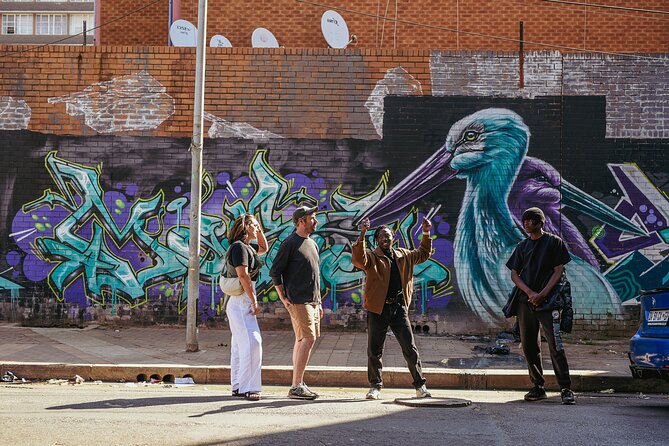 explore Joburg on foot, Johannesburg walking tours 2026, Maboneng street art walk, Soweto walking guide, Vilakazi Street tour, Johannesburg CBD heritage walk, Gandhi Square walking tour, Braamfontein art walk, Main Street Sundays Johannesburg, The Wilds Houghton walk, Walter Sisulu Botanical Garden trails, Klipriviersberg Nature Reserve walk, Curiocity inner city walking tour, Past Experiences Johannesburg, Dlala Nje Ponte tour, Joburg ETC