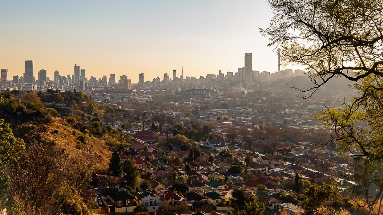 Johannesburg skyline sunset, Apartheid Museum exhibits interior, Maboneng street art Johannesburg, Arts on Main market scene, Soweto Vilakazi Street Mandela House, Hector Pieterson Memorial Soweto, Nelson Mandela Square statue Sandton, Pilanesberg safari elephants South Africa, Cradle of Humankind Maropeng fossils, Gautrain Johannesburg station, Joburg rooftop city views, township cuisine Vilakazi Street, Gold Reef City mining theme park, Rosebank Sunday Market crafts, Joburg ETC