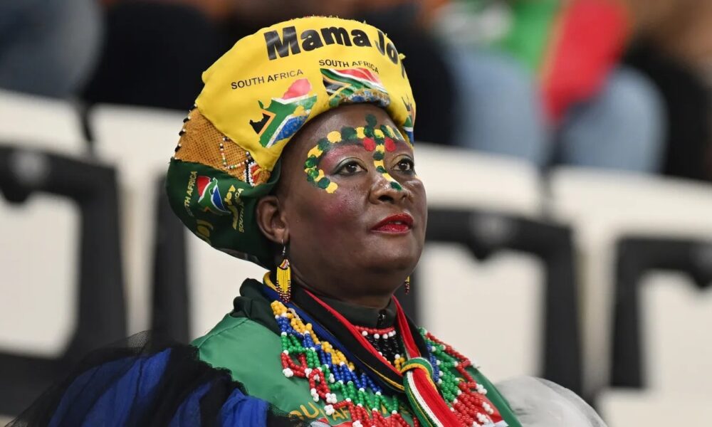 Mama Joy superfan South Africa, South African football fans stadium energy, Orlando Pirates supporter culture, FIFA World Cup South African fans, Gayton McKenzie press statement sport funding, South African superfans debate, Mamelodi Sundowns supporters stadium, Royal AM football fans South Africa, DSAC funding controversy SA, South African fan culture identity, Joburg ETC