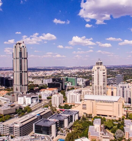 Johannesburg skyline Sandton, Rosebank street life cafes, Gautrain station platform Joburg, Uber ride Johannesburg night, Sandton hotels exterior, Joburg street market daytime, Soweto guided tour group, Johannesburg traffic lights cars, Melrose Arch walkway shops, Johannesburg travel safety tips, Joburg ETC