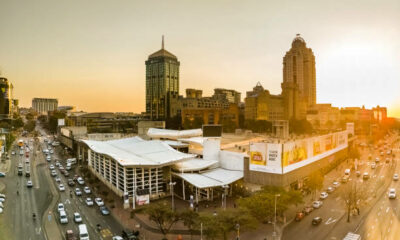 Johannesburg transport guide 2026, Gautrain Sandton station, Uber ride Johannesburg safety, Rosebank street scene, Sandton skyline South Africa, City Sightseeing red bus Johannesburg, Joburg tourist safety tips, OR Tambo airport Gautrain, Johannesburg driving safety tips, South Africa travel advice 2026, Joburg ETC