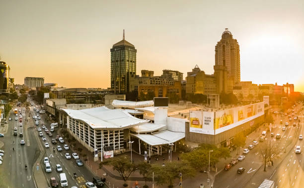 Johannesburg transport guide 2026, Gautrain Sandton station, Uber ride Johannesburg safety, Rosebank street scene, Sandton skyline South Africa, City Sightseeing red bus Johannesburg, Joburg tourist safety tips, OR Tambo airport Gautrain, Johannesburg driving safety tips, South Africa travel advice 2026, Joburg ETC