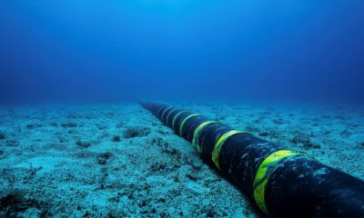undersea fibre optic cable ocean floor, submarine internet cable South Africa, global internet infrastructure seabed, subsea cable network Africa connectivity, SAEx cable concept, deep sea telecom cable, ocean fibre optic line, Joburg ETC