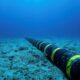 undersea fibre optic cable ocean floor, submarine internet cable South Africa, global internet infrastructure seabed, subsea cable network Africa connectivity, SAEx cable concept, deep sea telecom cable, ocean fibre optic line, Joburg ETC