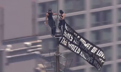 Watch: Empire State Building climbers arrested after rooftop proposal stunt in New York