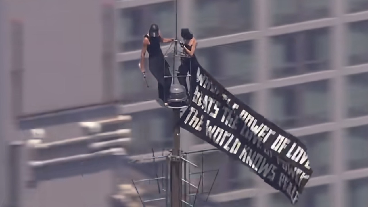 Watch: Empire State Building climbers arrested after rooftop proposal stunt in New York