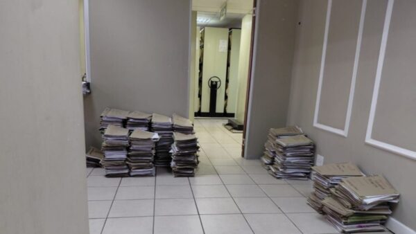Piles of documents on the floor are a common sight at the Johannesburg Master’s office.
